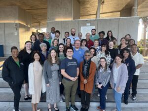 Group photo of Disaster Resilience Program Fellows, Symposium Attendees, and Equal Justice Works Staff at the Symposium welcome reception