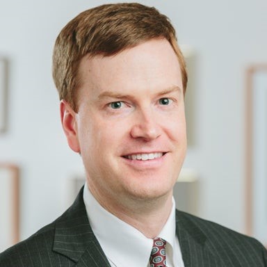 Headshot of John Geelan