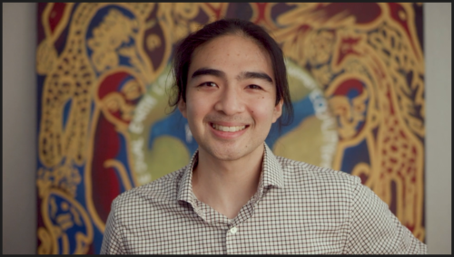 Daniel Pham looking directly smiling