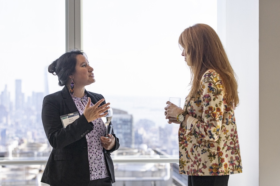 Equal Justice Works Fellows converse with staff and Board members at a Board meeting