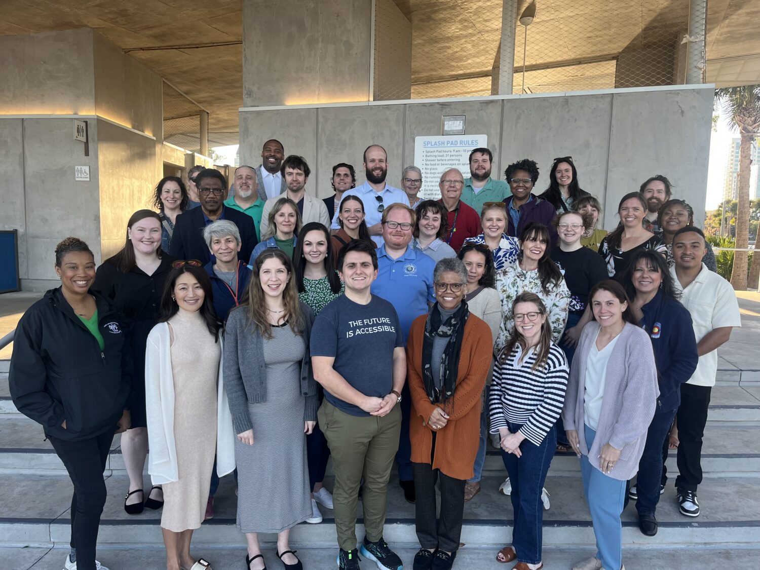 Group photo of Disaster Resilience Program Fellows, Symposium Attendees, and Equal Justice Works Staff at the Symposium welcome reception