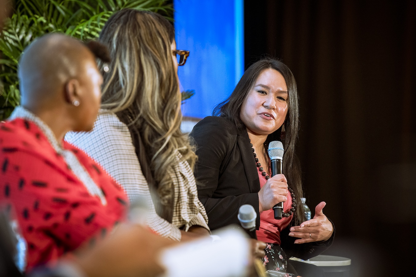 Photo of Kace Rodwell speaking on the opening plenary panel for 2025 Leadership Development Training