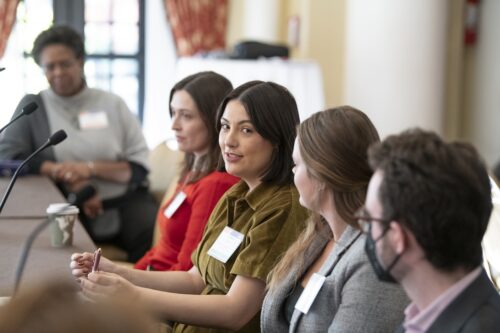 Photo of Fellows sitting and speaking at a breakout session at 2025 LDT