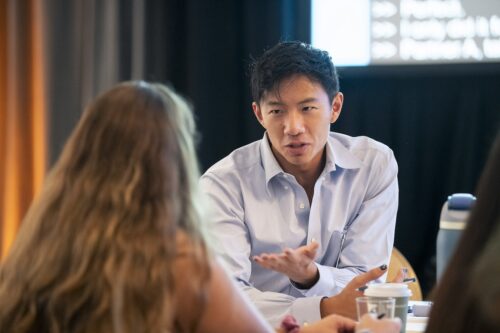 Photo of Fellows sitting and speaking at 2025 LDT