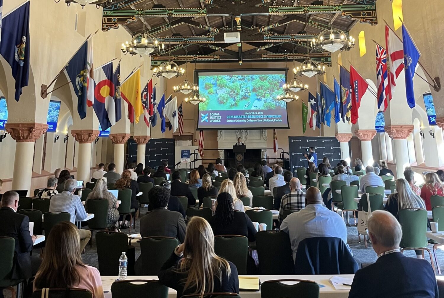 Photo of the Great Hall at Stetson, where attendees sit and watch Equal Justice Works CEO Verna Williams share welcome remarks